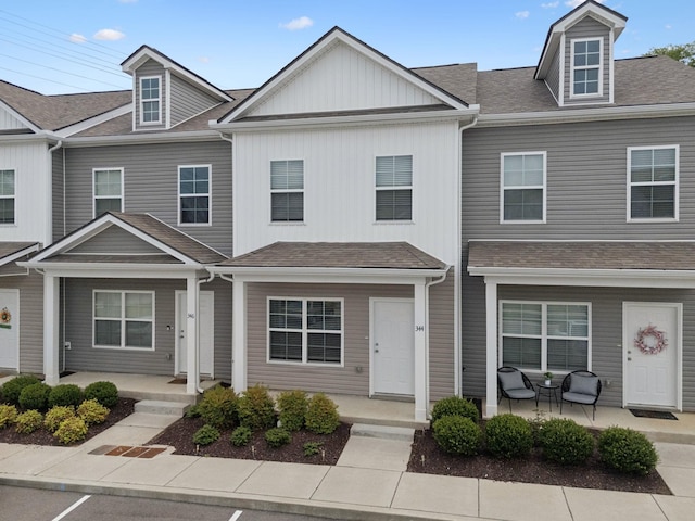 344 Kristen Ct, Columbia, TN 38401 - townhome / multi-family property with a porch and roof with shingles