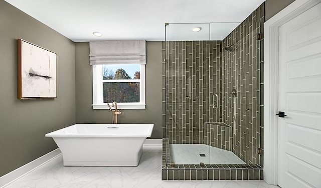 26 Cowan Ct, Mount Juliet, TN 37122 - bathroom with a shower stall, a freestanding tub, marble finish floors, and recessed lighting