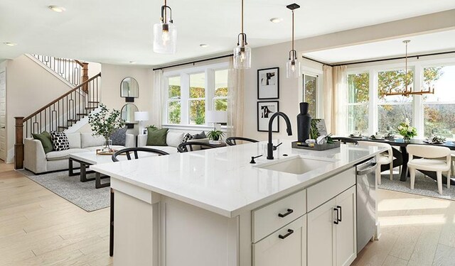 26 Cowan Ct, Mount Juliet, TN 37122 - kitchen with stainless steel dishwasher, light wood-style flooring, an island with sink, a chandelier, and recessed lighting