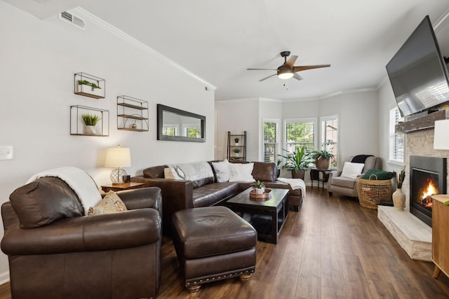 2016 Roderick Cir, Franklin, TN 37064 - living room with ceiling fan, dark wood-style flooring, a stone fireplace, and crown molding