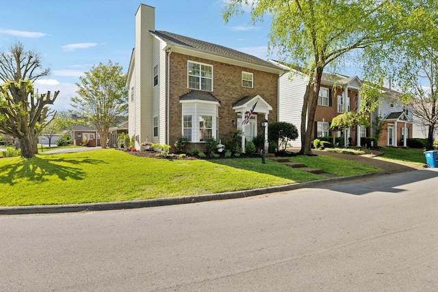 2016 Roderick Cir, Franklin, TN 37064 - view of front of home featuring a chimney, a front lawn, and a residential view