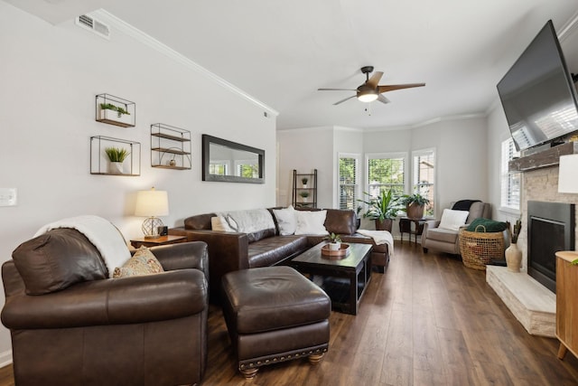 2016 Roderick Cir, Franklin, TN 37064 - living room featuring ceiling fan, dark wood-style floors, ornamental molding, and a stone fireplace