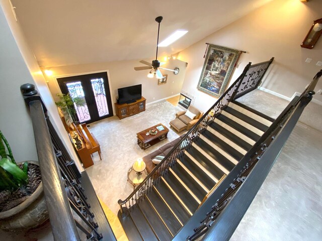 2214 Henpeck Ln, Franklin, TN 37064 - carpeted living room featuring vaulted ceiling and a ceiling fan