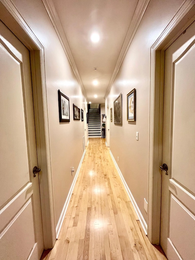 2214 Henpeck Ln, Franklin, TN 37064 - hall featuring light wood finished floors, ornamental molding, and stairs
