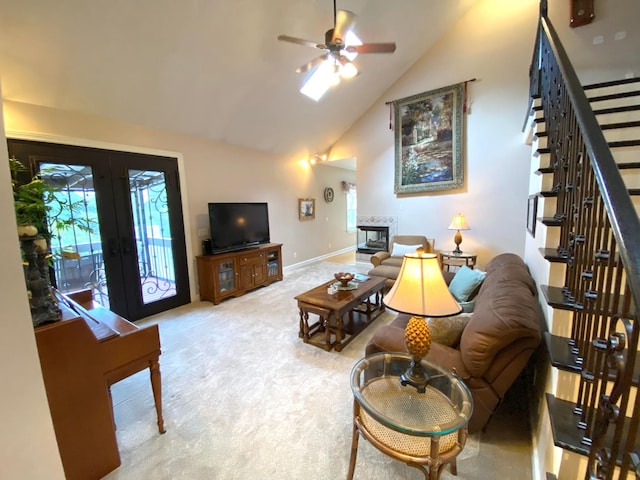 2214 Henpeck Ln, Franklin, TN 37064 - living room featuring carpet floors, french doors, stairway, ceiling fan, and high vaulted ceiling