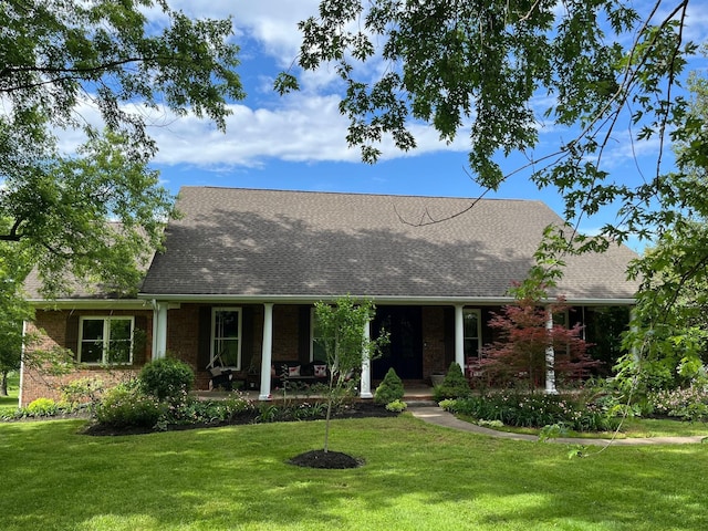 2214 Henpeck Ln, Franklin, TN 37064 - view of front of home featuring a porch, roof with shingles, and a front yard