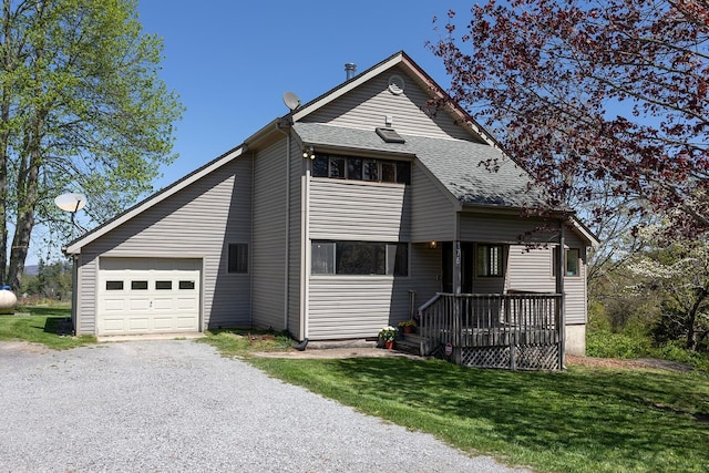 175 Twitty Rd, Dunlap, TN 37327 - view of front of house with an attached garage, gravel driveway, a shingled roof, and a front yard
