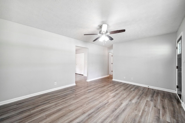643 Artic Ave, Oak Grove, KY 42262 - empty room featuring ceiling fan, wood finished floors, and a textured ceiling