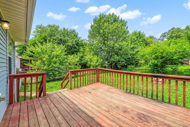 643 Artic Ave, Oak Grove, KY 42262 - wooden deck featuring a lawn