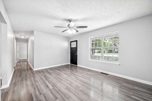643 Artic Ave, Oak Grove, KY 42262 - unfurnished room featuring wood finished floors, a ceiling fan, and a textured ceiling