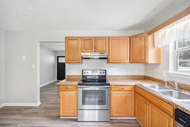 643 Artic Ave, Oak Grove, KY 42262 - kitchen featuring appliances with stainless steel finishes, under cabinet range hood, wood finished floors, light countertops, and a textured ceiling