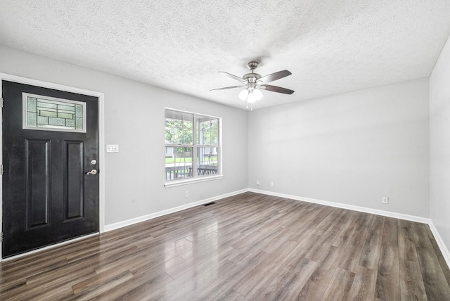 643 Artic Ave, Oak Grove, KY 42262 - foyer with dark wood finished floors, a ceiling fan, and a textured ceiling