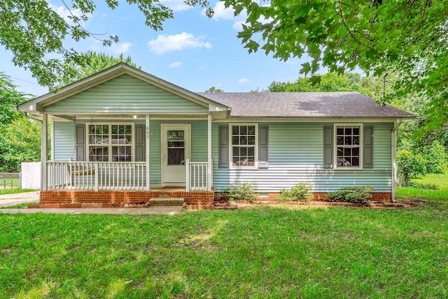 643 Artic Ave, Oak Grove, KY 42262 - ranch-style home featuring covered porch, a front lawn, and a shingled roof