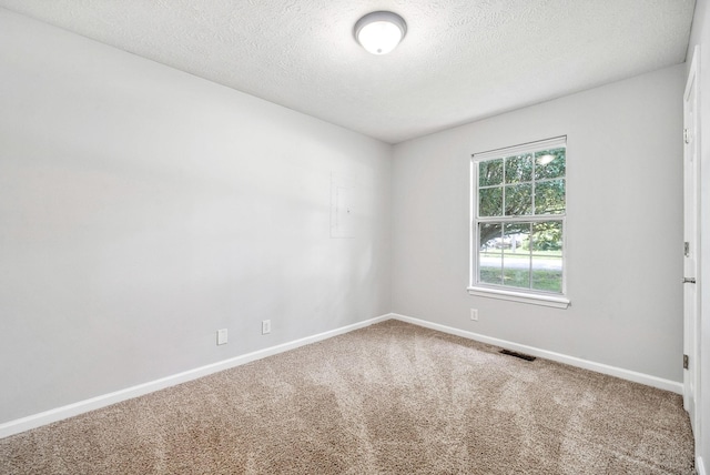 643 Artic Ave, Oak Grove, KY 42262 - carpeted empty room featuring a textured ceiling and baseboards