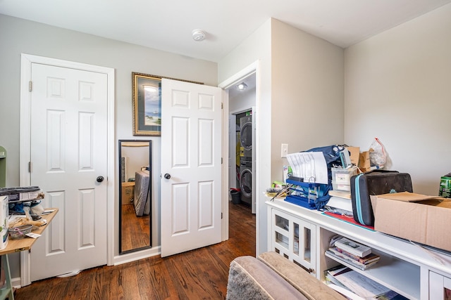100 Beech St, Columbia, TN 38401 - living area featuring stacked washer and clothes dryer and wood finished floors