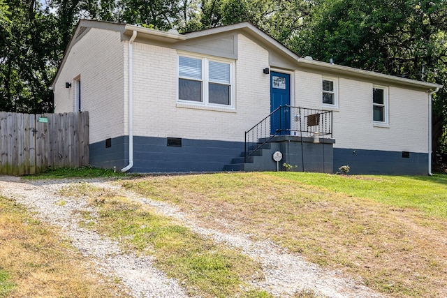 100 Beech St, Columbia, TN 38401 - view of front facade with crawl space and brick siding