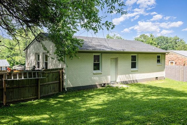 100 Beech St, Columbia, TN 38401 - rear view of house with brick siding and a shingled roof