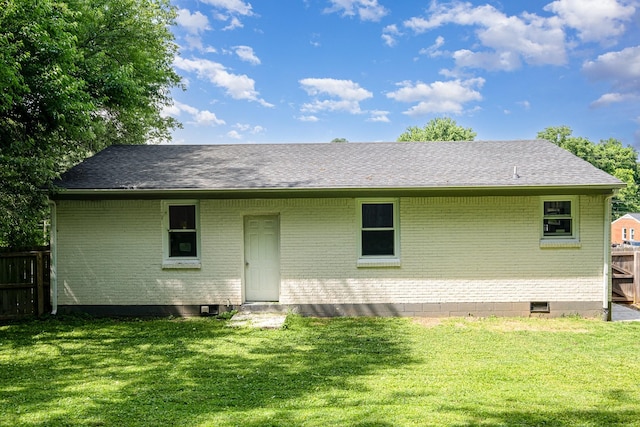100 Beech St, Columbia, TN 38401 - rear view of house featuring brick siding, roof with shingles, and crawl space