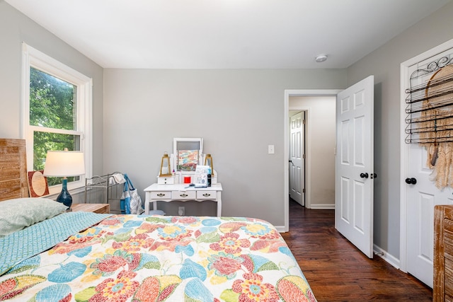 100 Beech St, Columbia, TN 38401 - bedroom featuring dark wood-type flooring and baseboards