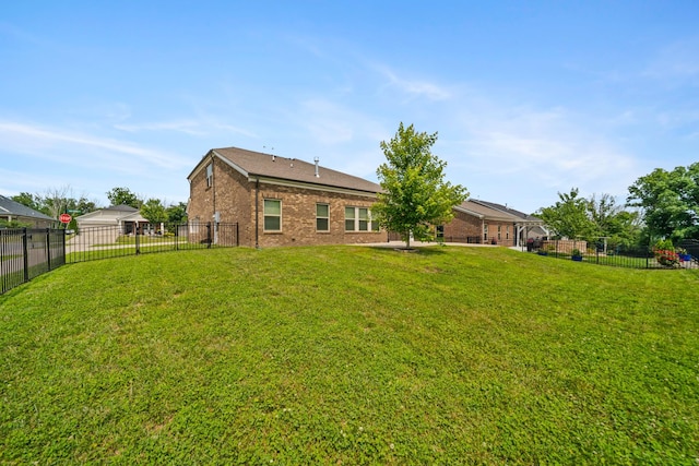 805 Dunbar Ct, Goodlettsville, TN 37072 - rear view of house with brick siding and a fenced backyard