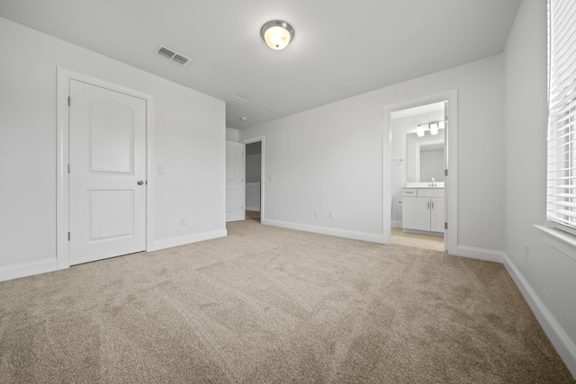 805 Dunbar Ct, Goodlettsville, TN 37072 - unfurnished bedroom featuring light carpet and ensuite bathroom