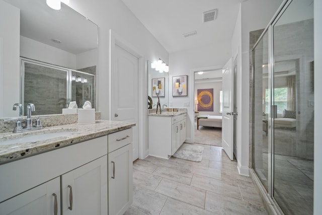 805 Dunbar Ct, Goodlettsville, TN 37072 - full bathroom featuring two vanities, a shower stall, and ensuite bath