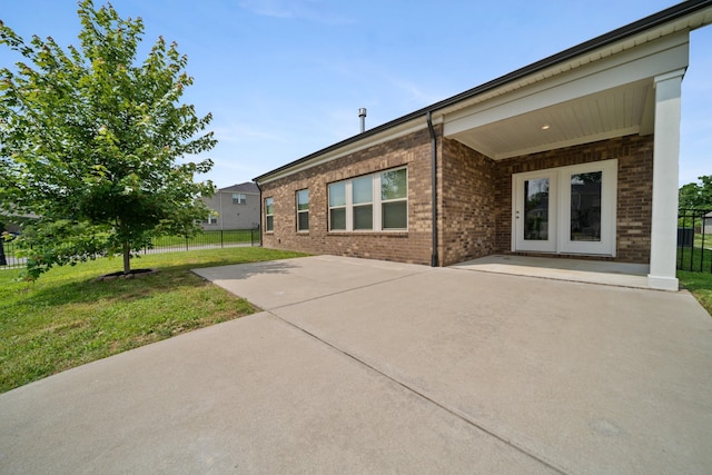 805 Dunbar Ct, Goodlettsville, TN 37072 - rear view of property with brick siding, a patio, and french doors