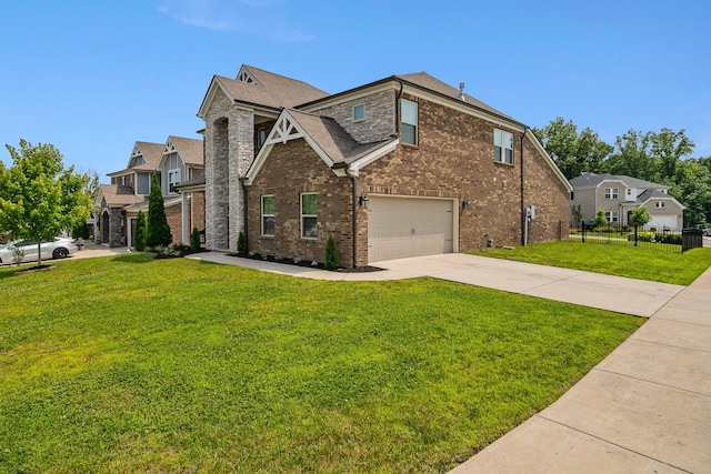 805 Dunbar Ct, Goodlettsville, TN 37072 - view of front facade with driveway, a garage, brick siding, and a shingled roof