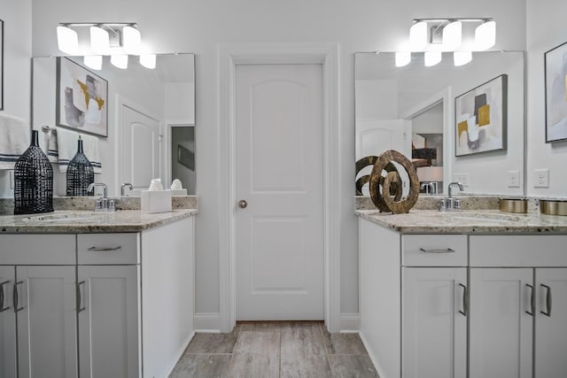 805 Dunbar Ct, Goodlettsville, TN 37072 - full bathroom with two vanities and wood finished floors