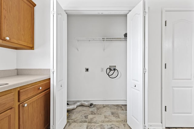 912 Patty Cv, La Vergne, TN 37086 - laundry room with washer hookup, hookup for an electric dryer, and stone finish flooring