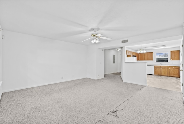 912 Patty Cv, La Vergne, TN 37086 - unfurnished living room with ceiling fan, a chandelier, and light colored carpet