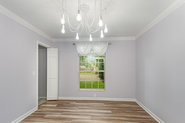 3516 Saxon Mist Ct, Nashville, TN 37217 - unfurnished room with a chandelier, wood finished floors, and ornamental molding