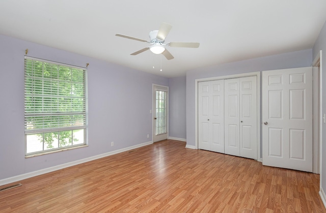 3516 Saxon Mist Ct, Nashville, TN 37217 - unfurnished bedroom with light wood-style floors, a closet, and a ceiling fan