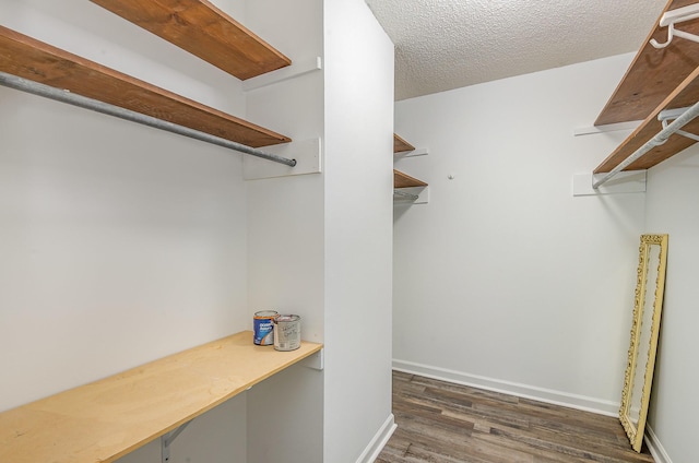3516 Saxon Mist Ct, Nashville, TN 37217 - spacious closet featuring wood finished floors and built in study area