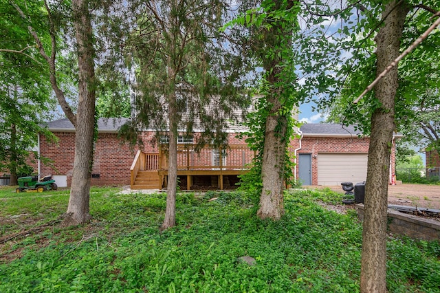 3516 Saxon Mist Ct, Nashville, TN 37217 - back of property featuring brick siding, a deck, a garage, and a shingled roof