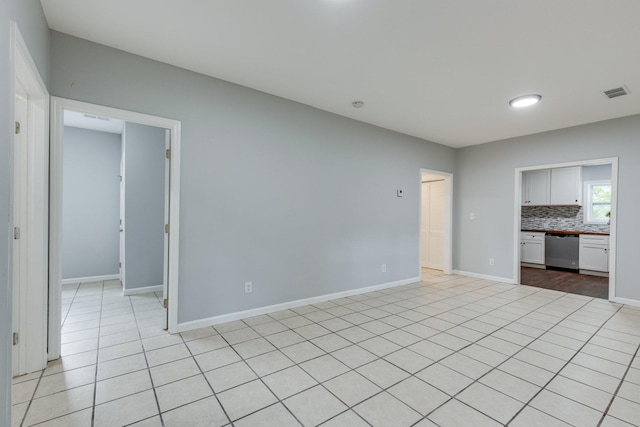 1689 Sumac Rd, Pulaski, TN 38478 - unfurnished living room with light tile patterned flooring and baseboards