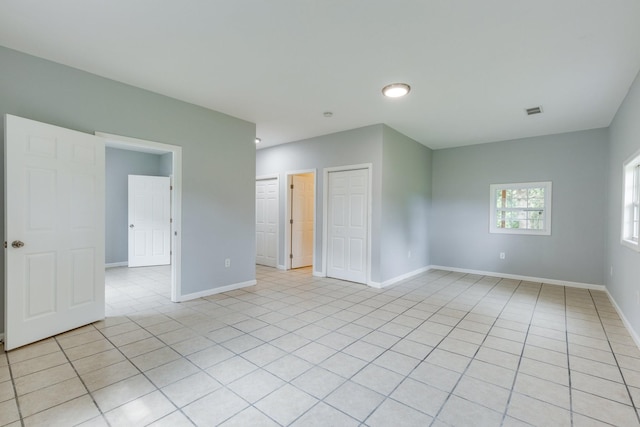 1689 Sumac Rd, Pulaski, TN 38478 - unfurnished bedroom featuring light tile patterned floors and a closet