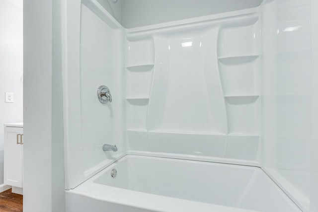 1689 Sumac Rd, Pulaski, TN 38478 - bathroom featuring tub / shower combination and wood finished floors