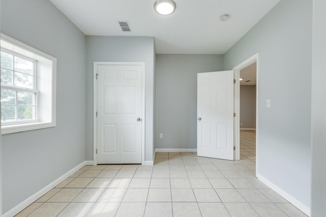 1689 Sumac Rd, Pulaski, TN 38478 - unfurnished bedroom with light tile patterned floors and baseboards