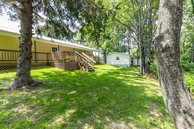 1689 Sumac Rd, Pulaski, TN 38478 - view of green lawn featuring a wooden deck