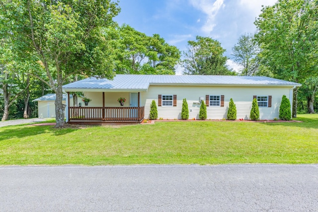 1689 Sumac Rd, Pulaski, TN 38478 - ranch-style house with covered porch, a front lawn, a metal roof, and an outbuilding