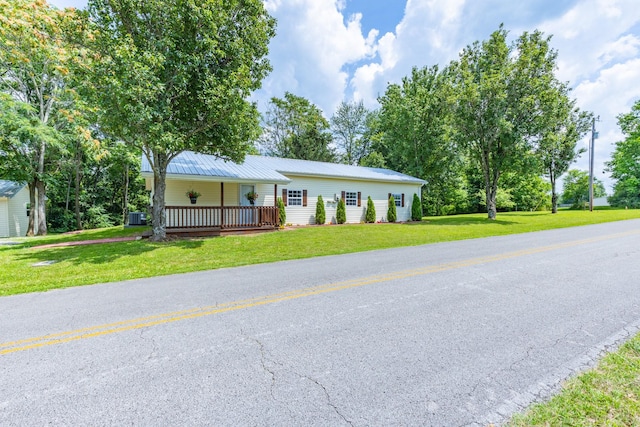 1689 Sumac Rd, Pulaski, TN 38478 - single story home with a porch, a front yard, and a metal roof