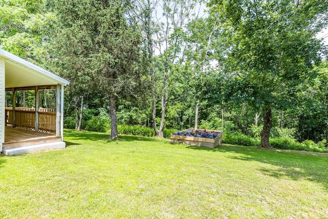 1689 Sumac Rd, Pulaski, TN 38478 - view of green lawn featuring a wooden deck