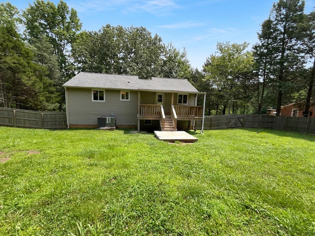 7120 Sutton Pl, Fairview, TN 37062 - rear view of house with a fenced backyard and a wooden deck