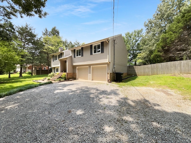 7120 Sutton Pl, Fairview, TN 37062 - raised ranch featuring gravel driveway and an attached garage