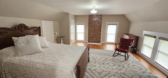 315 Seven Mile Ferry Rd, Cunningham, TN 37052 - bedroom with lofted ceiling and light wood-style floors