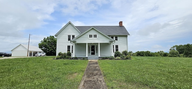 315 Seven Mile Ferry Rd, Cunningham, TN 37052 - traditional-style home with a chimney, a porch, and a front yard