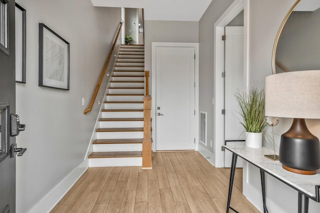 705 27th Ave N, Nashville, TN 37208 - entrance foyer with light wood-style flooring and stairway