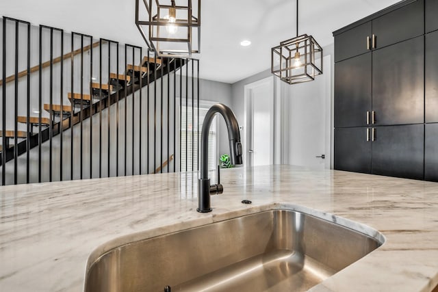 705 27th Ave N, Nashville, TN 37208 - kitchen view of light stone countertops, recessed lighting, and pendant lighting