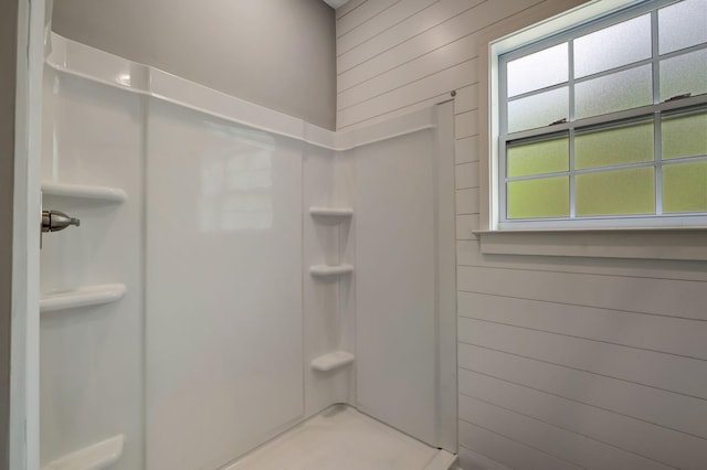 94 Hickory Ridge Ln, Woodbury, TN 37190 - bathroom featuring wooden walls and a stall shower